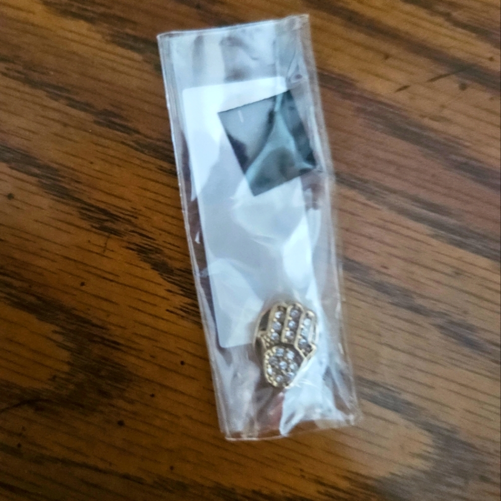 Hand charm